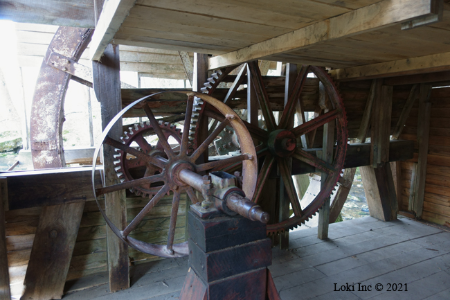 Mill interior with gears and pulley