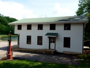 Mill and old gasoline pump