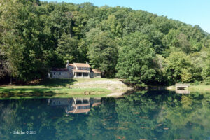 View of Fuchs house at Markham Springs from across mill pond