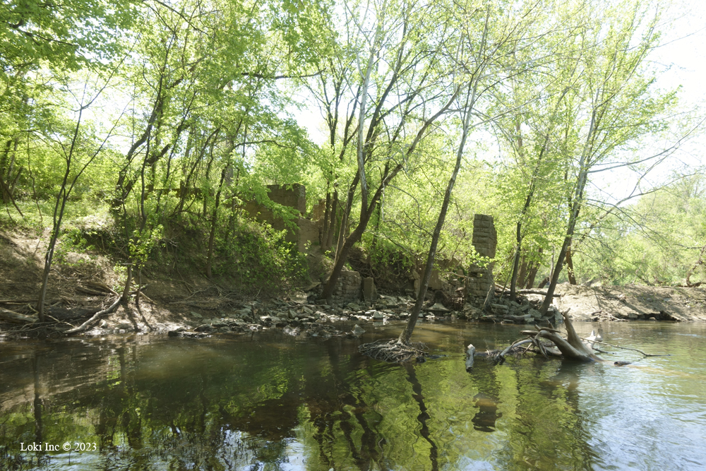 Byrnes Mill foundation, raceway, wall and dam from the bank of the Big River