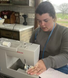 Hanna Kelly sewing