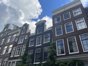 canal view of West Church in Amsterdam